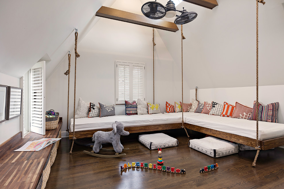 Kids' room - mid-sized transitional gender-neutral medium tone wood floor kids' room idea in Other with white walls