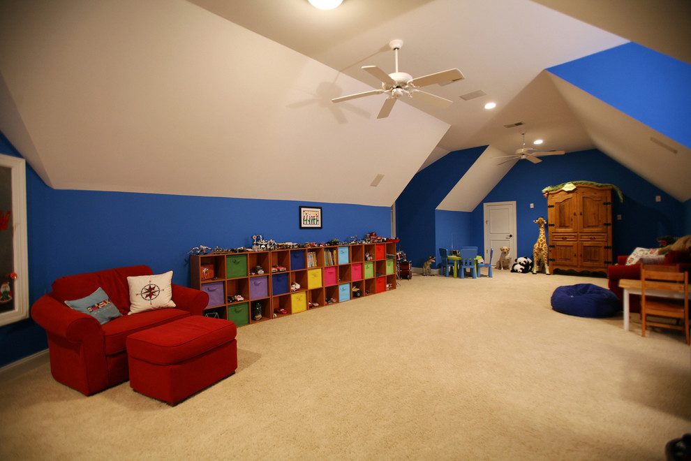 Foto di un'ampia cameretta per bambini da 4 a 10 anni tradizionale con pareti blu e moquette