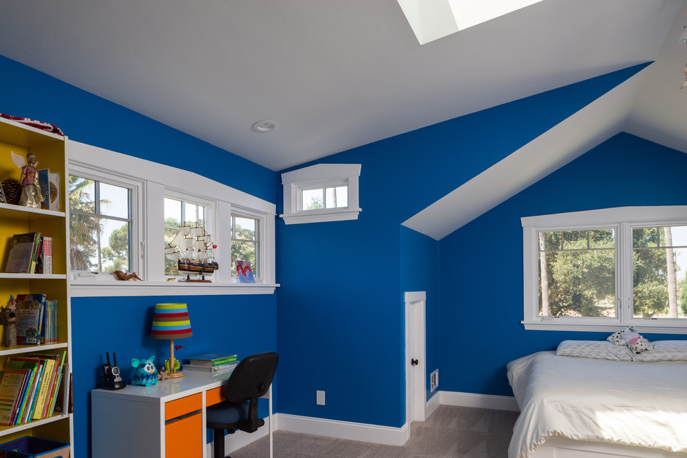 Example of an arts and crafts gender-neutral carpeted and gray floor kids' bedroom design in San Francisco with blue walls