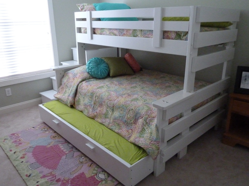 Medium sized contemporary children’s room for girls in Other with grey walls and carpet.