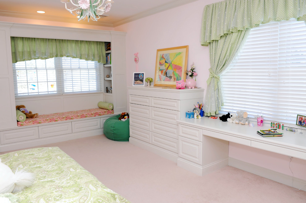 Mid-sized elegant girl carpeted kids' room photo in Philadelphia with pink walls