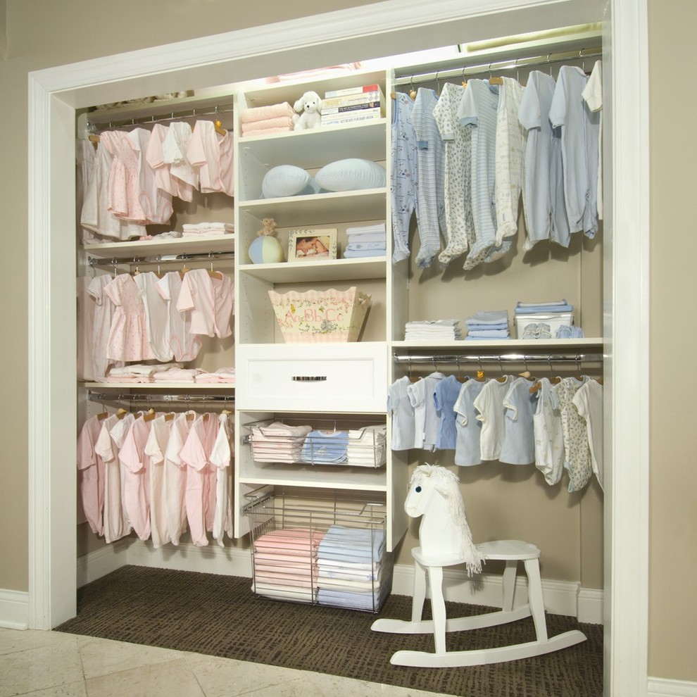 Inspiration for a mid-sized shabby-chic style carpeted closet remodel in Other