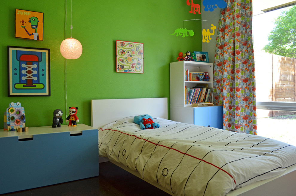 Example of a mid-century modern boy kids' room design in Dallas with green walls
