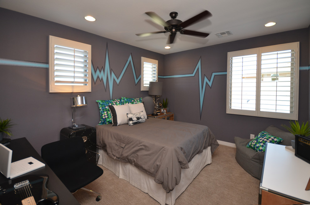 Example of a mid-sized minimalist boy carpeted kids' room design in Phoenix with blue walls