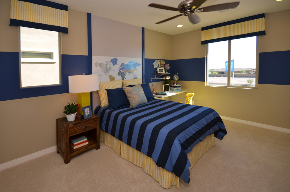 This is an example of a medium sized modern children’s room for boys in Phoenix with multi-coloured walls and carpet.