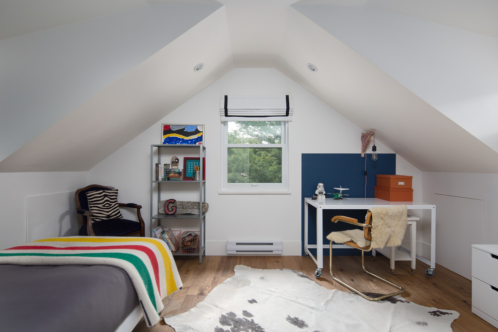 Small traditional teen’s room for boys in Vancouver with white walls and light hardwood flooring.
