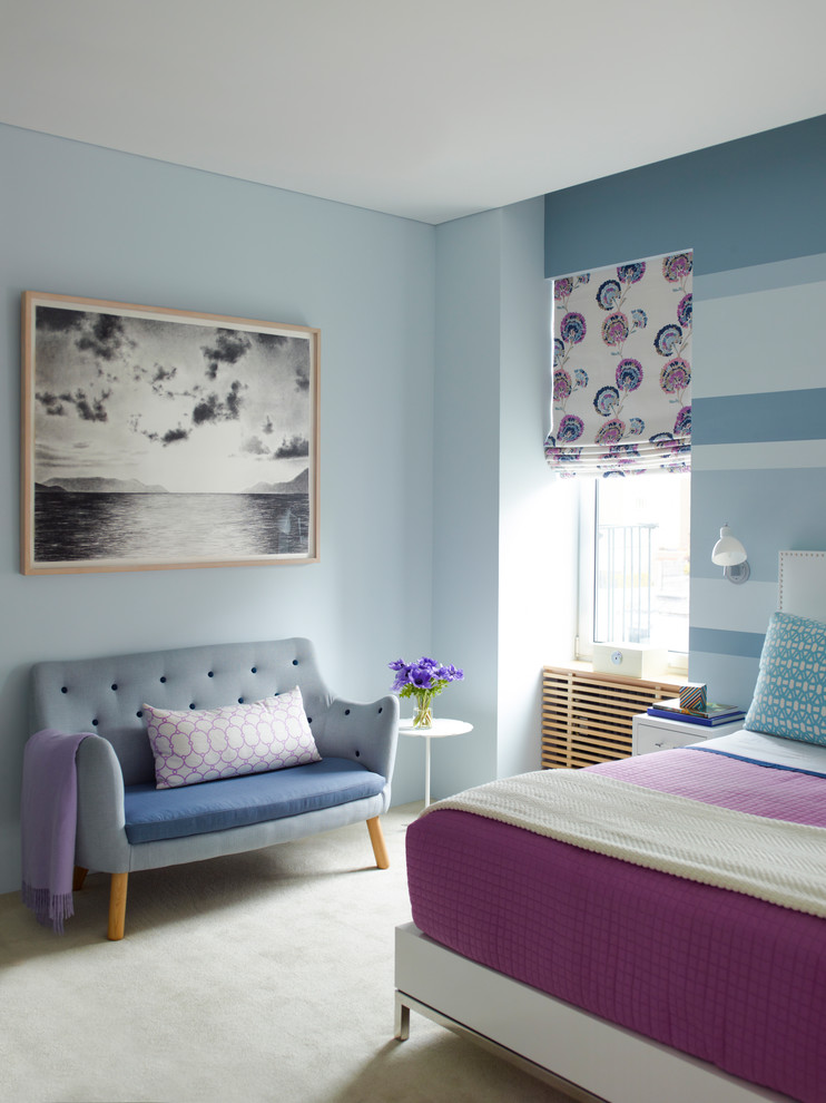 Transitional girl carpeted and beige floor kids' room photo in New York with blue walls