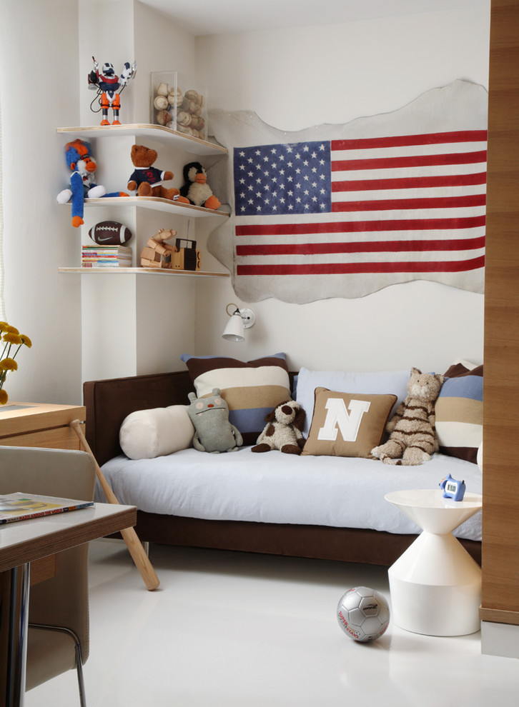 Trendy boy kids' bedroom photo in New York with beige walls
