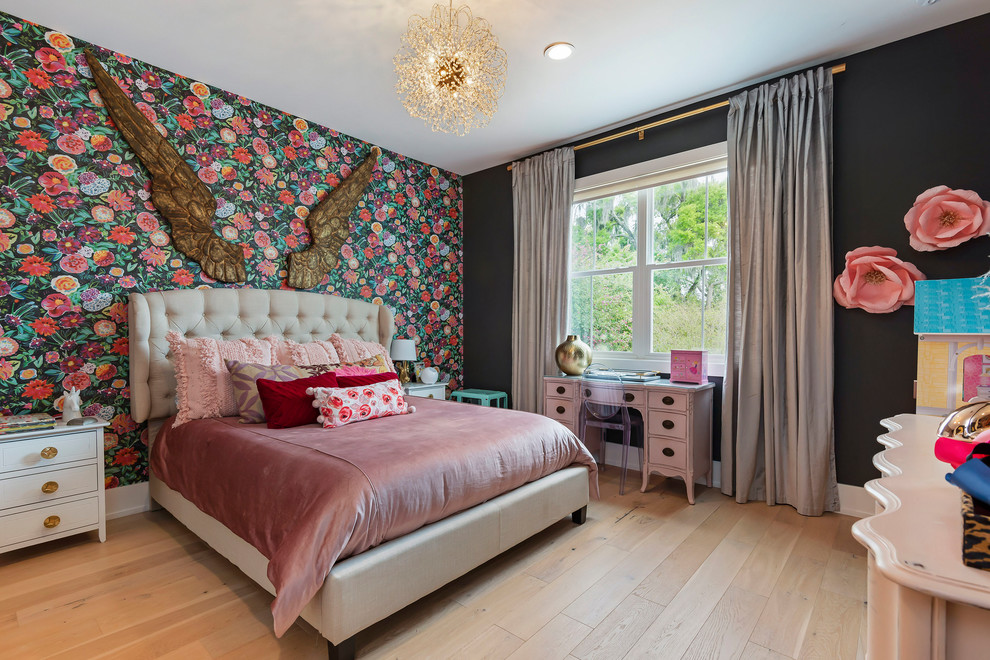 Inspiration for a large transitional girl light wood floor and beige floor kids' room remodel in Orlando with black walls