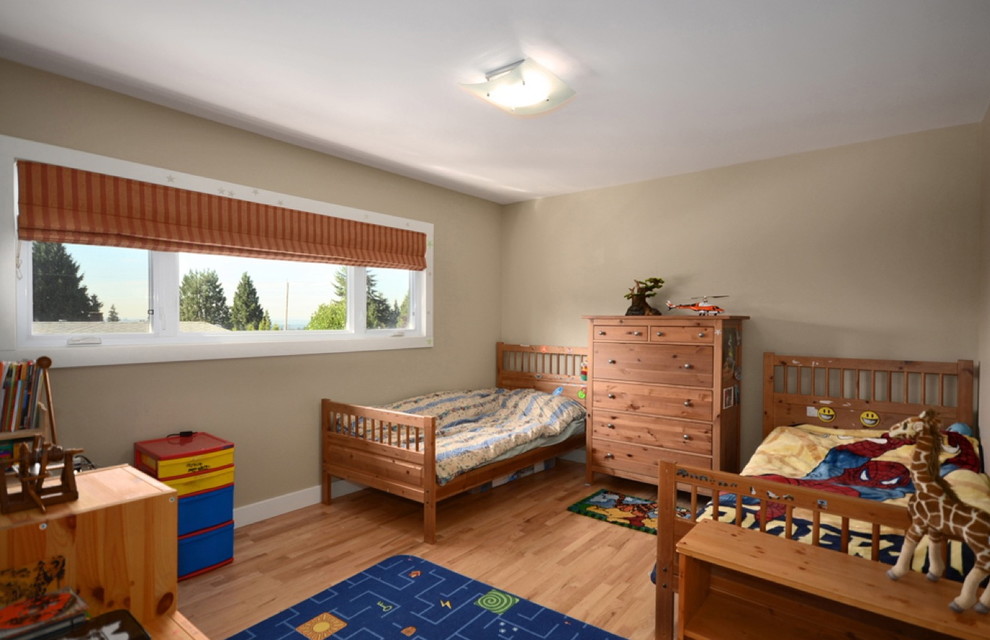 Idée de décoration pour une chambre d'enfant de 1 à 3 ans design de taille moyenne.