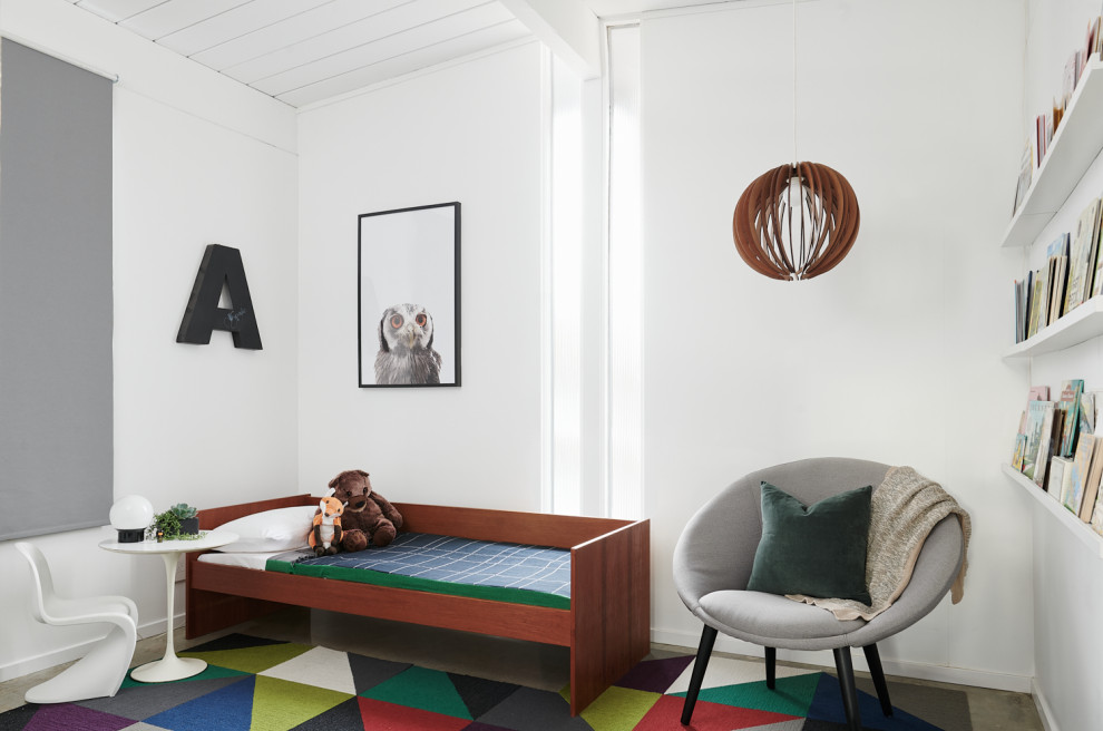На фото: нейтральная детская в стиле ретро с спальным местом, белыми стенами, бетонным полом, серым полом, потолком из вагонки и сводчатым потолком с