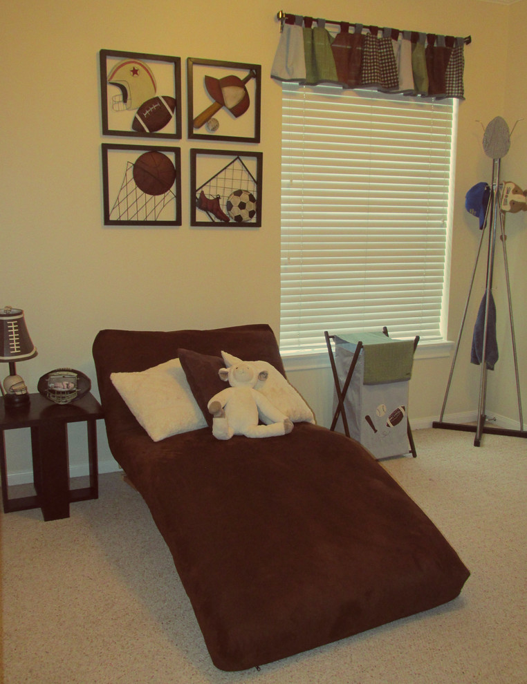 Photo of a medium sized vintage toddler’s room for boys in Houston with yellow walls and carpet.