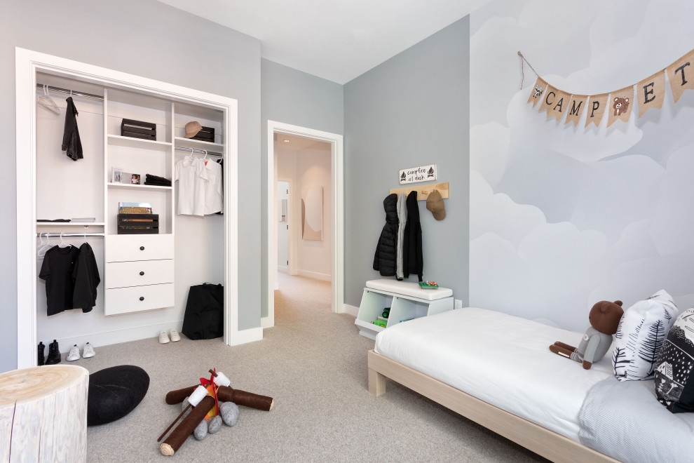 Design ideas for a small scandi children’s room for boys in Vancouver with blue walls, carpet, grey floors and wallpapered walls.
