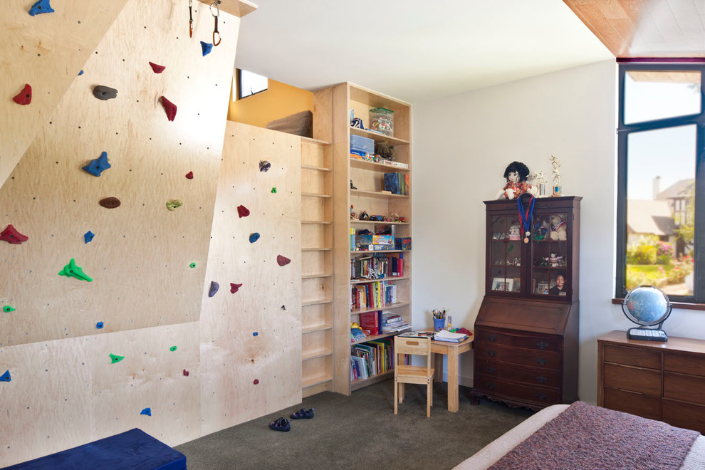 Idées déco pour une chambre d'enfant éclectique avec sol en béton ciré.