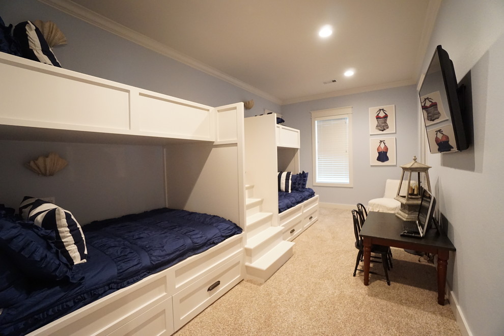 Foto di una cameretta per bambini da 4 a 10 anni stile marinaro di medie dimensioni con pareti blu e moquette