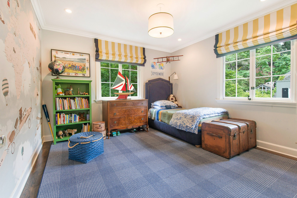 Inspiration pour une chambre d'enfant traditionnelle de taille moyenne avec un mur bleu et moquette.