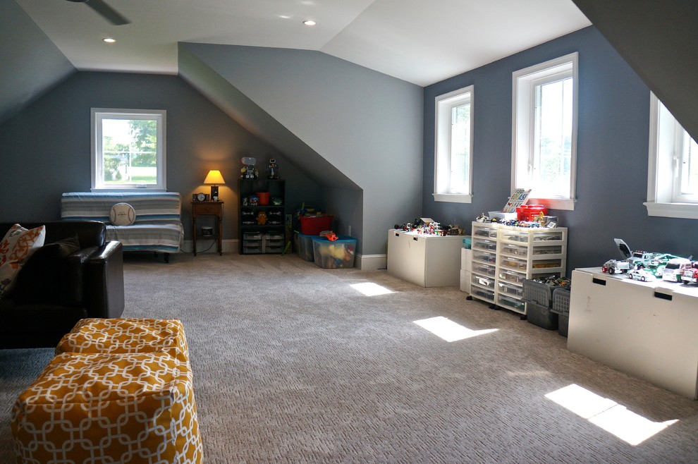 Immagine di una cameretta per bambini da 4 a 10 anni minimalista di medie dimensioni con pareti blu, moquette e pavimento beige