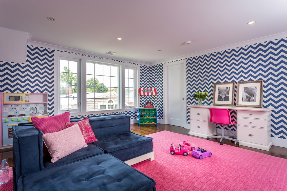 Traditional kids' bedroom for girls in New York with dark hardwood flooring and multi-coloured walls.