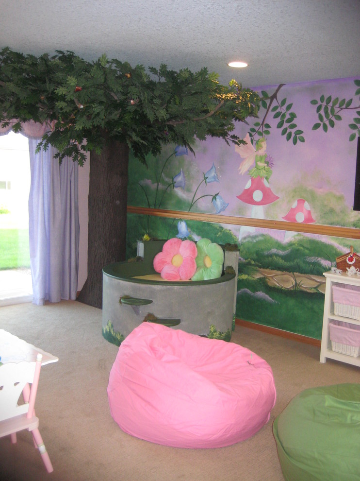 Inspiration for a mid-sized girl carpeted kids' room remodel in Minneapolis with multicolored walls