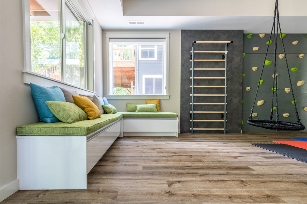 Design ideas for an expansive contemporary gender neutral kids' bedroom in Seattle with black walls, dark hardwood flooring and brown floors.