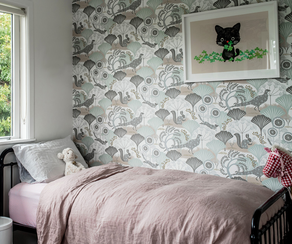 Inspiration for a medium sized contemporary children’s room for girls in Auckland with carpet, grey floors and multi-coloured walls.