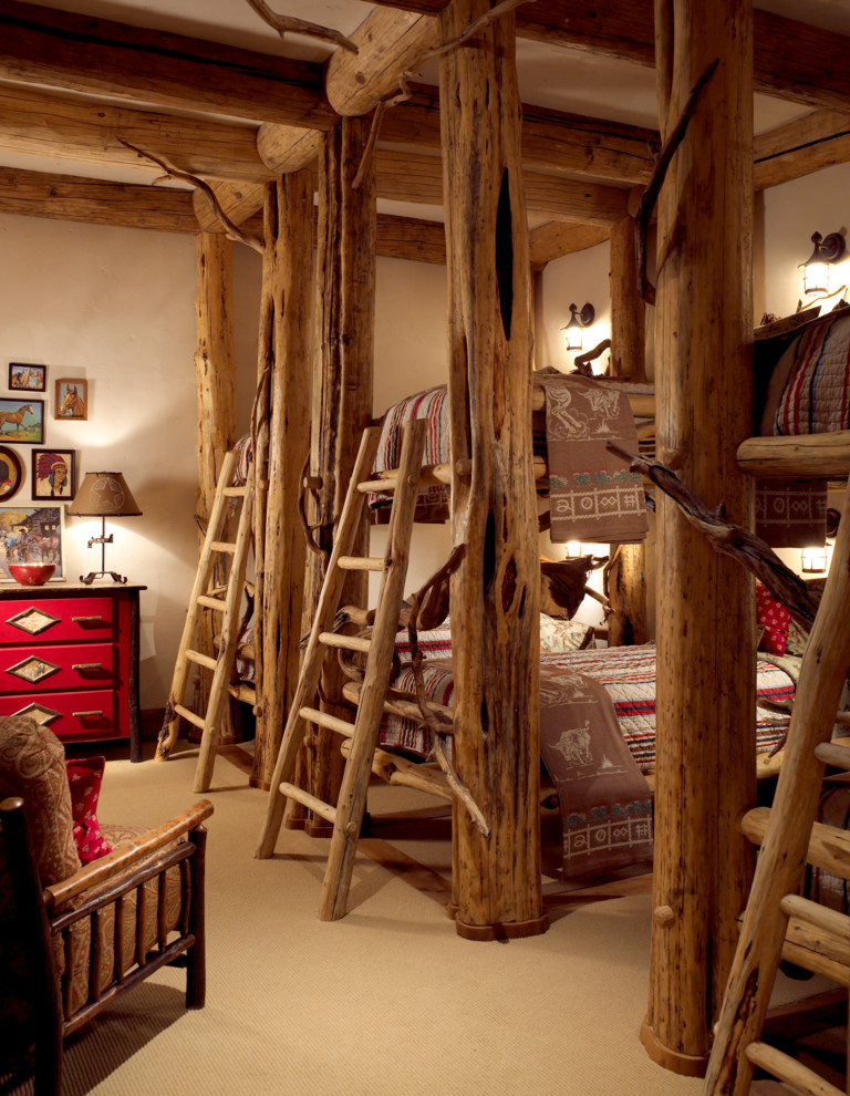 Ejemplo de dormitorio infantil rural con paredes beige