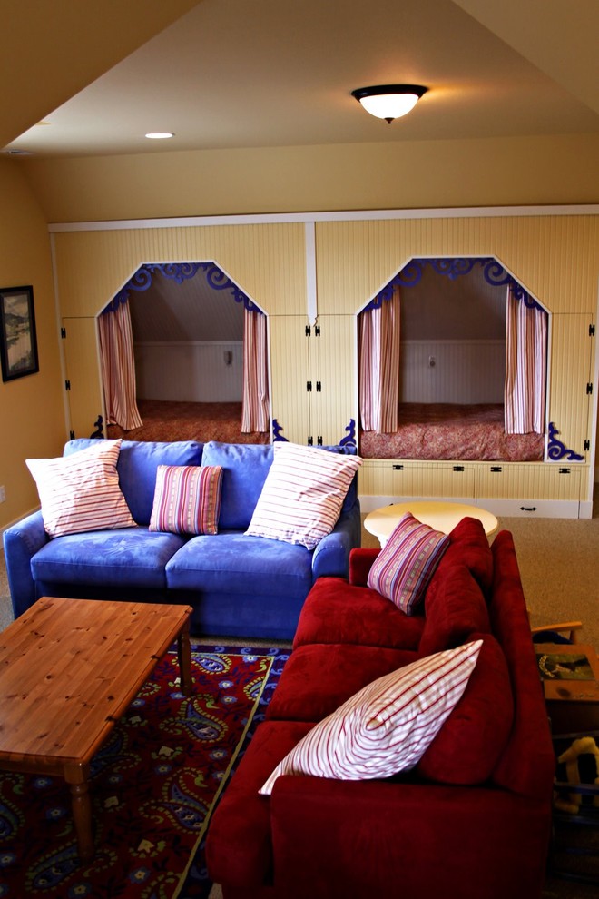 This is an example of an eclectic gender neutral kids' bedroom in Seattle with yellow walls.