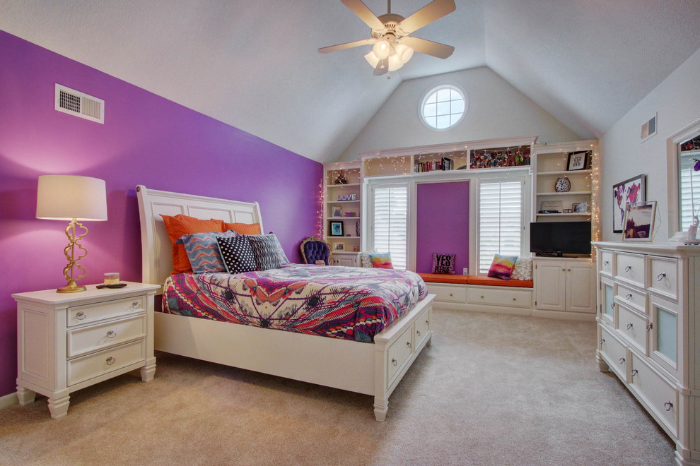 Kids' room - mid-sized transitional girl carpeted kids' room idea in Kansas City with purple walls