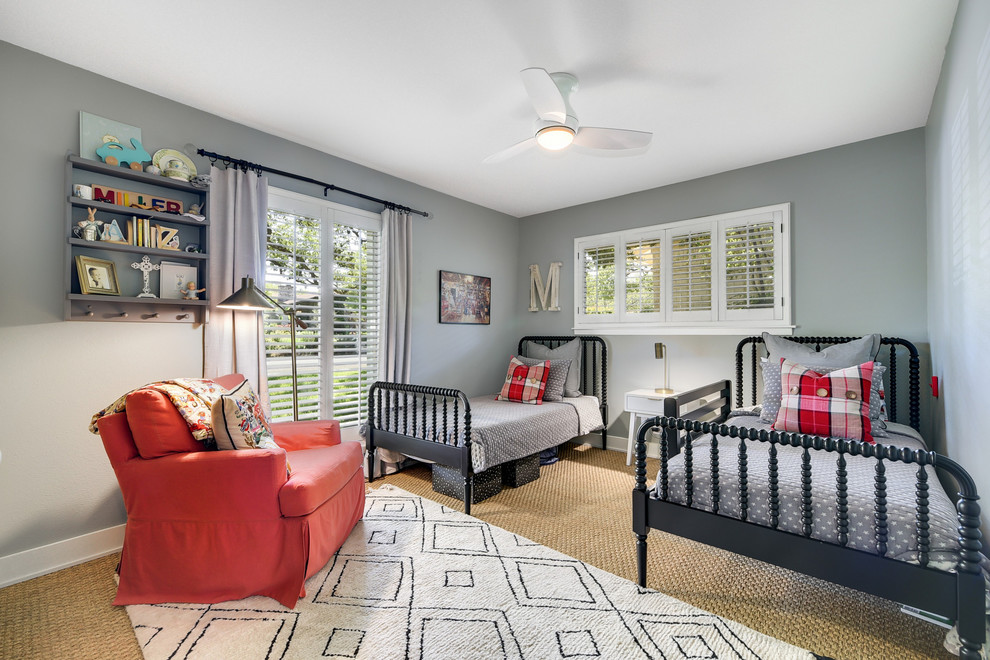 Country boy carpeted and beige floor kids' room photo in Austin with gray walls