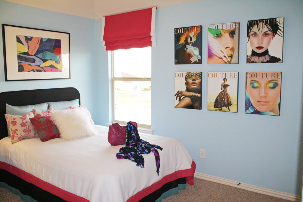 Example of a trendy kids' room design in Dallas with blue walls