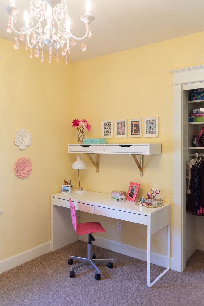 Inspiration for a small transitional girl carpeted kids' room remodel in Portland with yellow walls