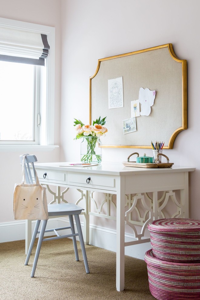 Example of a classic girl carpeted kids' room design in Salt Lake City with pink walls