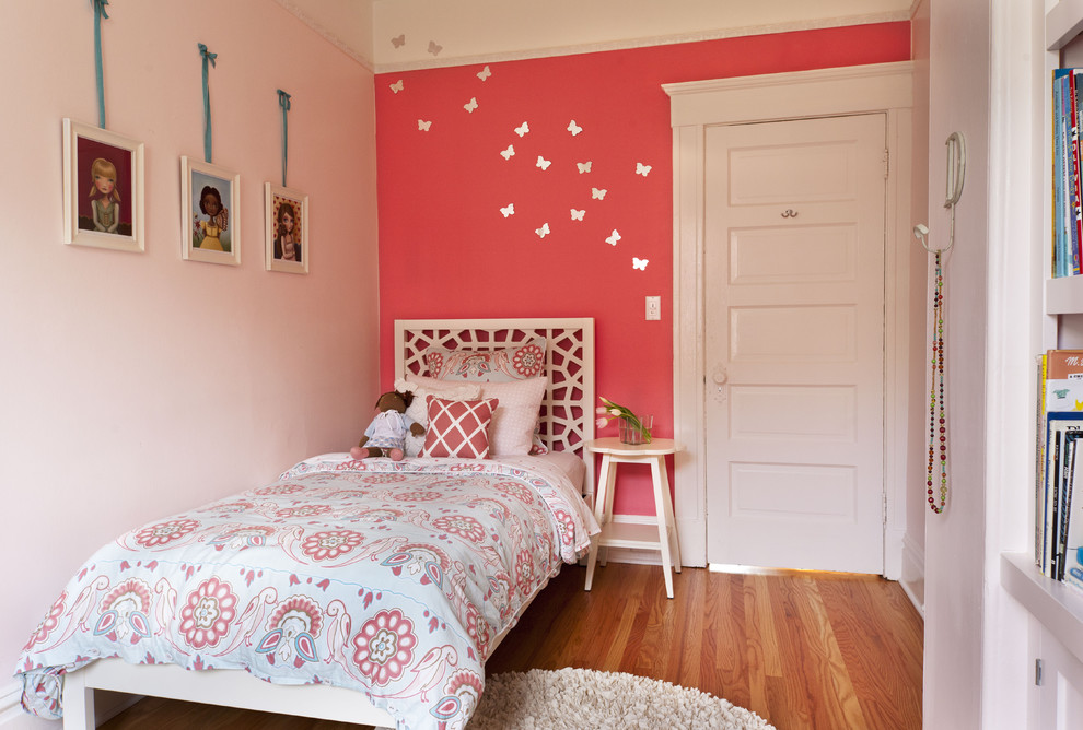 Design ideas for a classic kids' bedroom in San Francisco with pink walls.