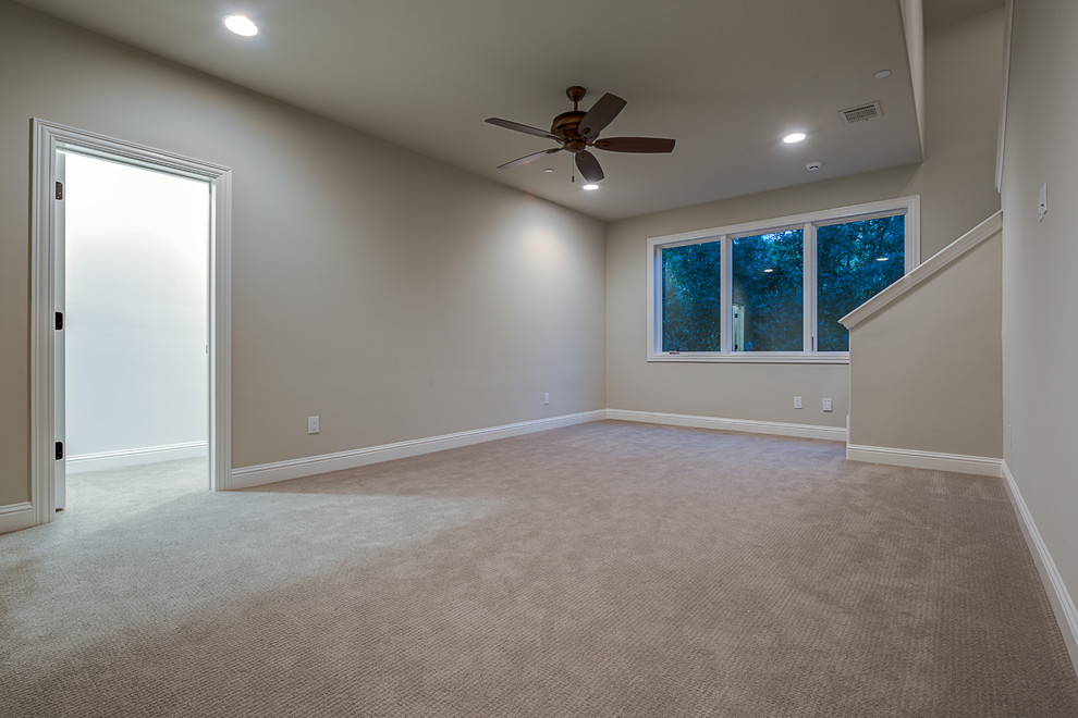 Large mediterranean gender neutral playroom in Dallas with white walls and carpet.