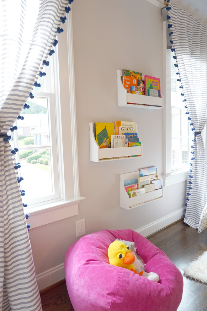 Inspiration for a medium sized contemporary toddler’s room for girls in Atlanta with grey walls, dark hardwood flooring and brown floors.