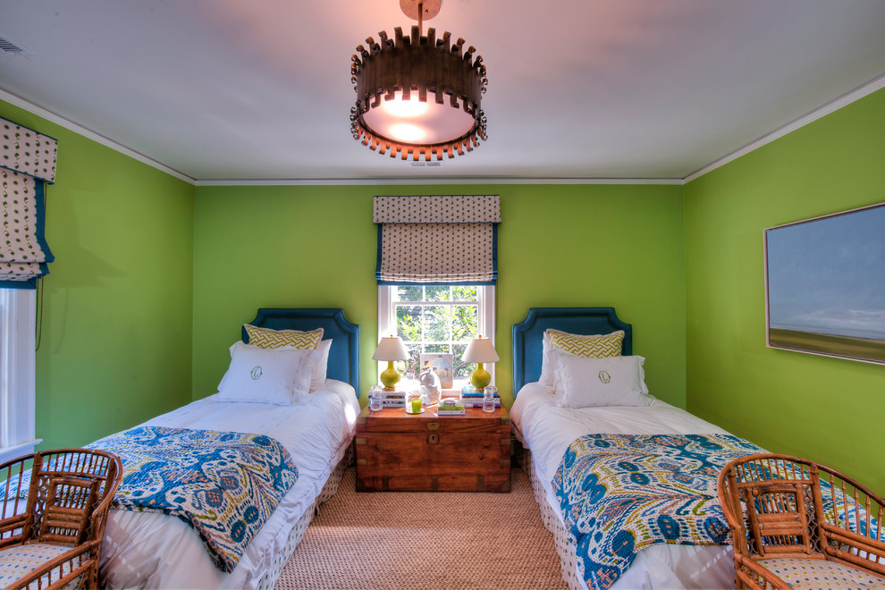 Inspiration for an eclectic children’s room for girls in Charlotte with green walls and carpet.