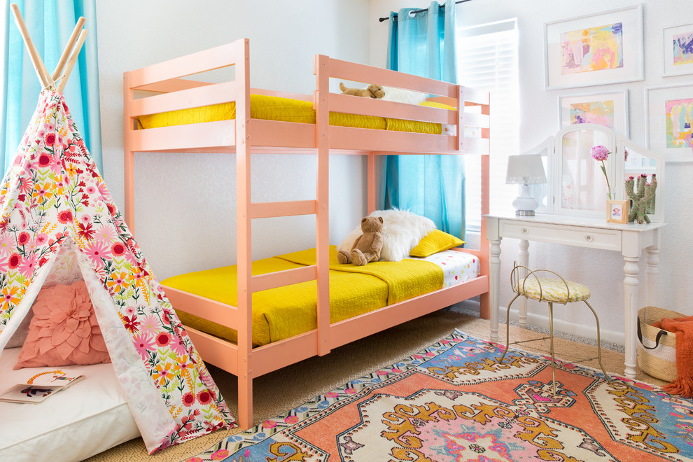 Inspiration for an eclectic children’s room for girls in Austin with white walls.