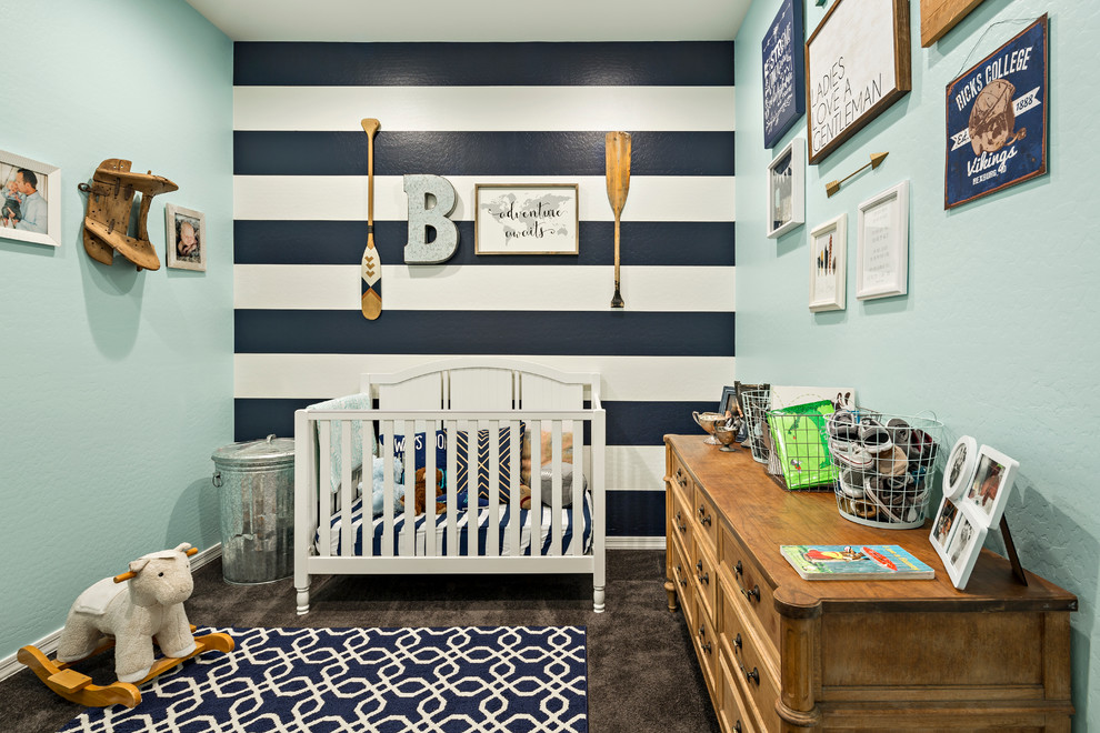Medium sized eclectic children’s room for boys in Phoenix with carpet and multi-coloured walls.