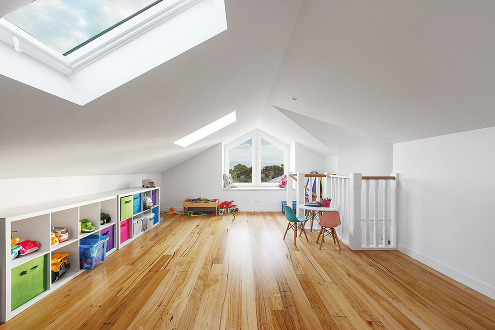 Inspiration for a large contemporary gender-neutral medium tone wood floor kids' room remodel in Melbourne with white walls