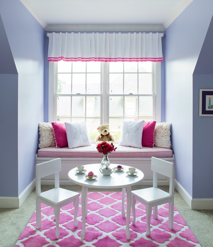 Photo of a medium sized traditional children’s room for girls in Atlanta with carpet and blue walls.