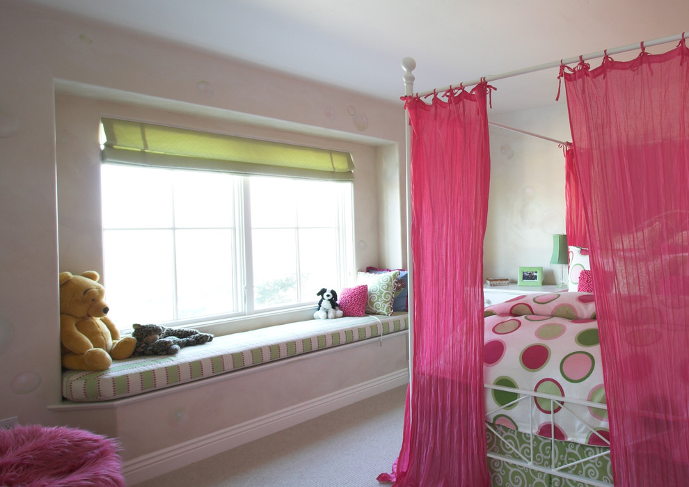 This is an example of a large classic teen’s room for girls in San Francisco with white walls and carpet.