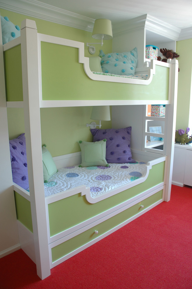 Design ideas for a small world-inspired kids' bedroom for girls in New York with green walls and carpet.