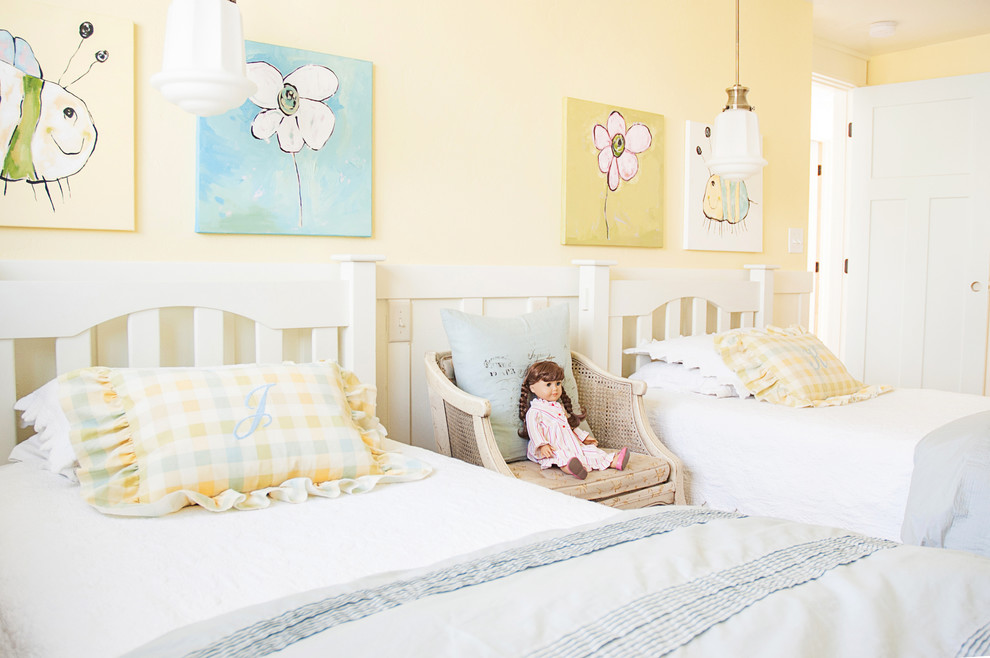 Mid-sized elegant girl kids' bedroom photo in Other with yellow walls