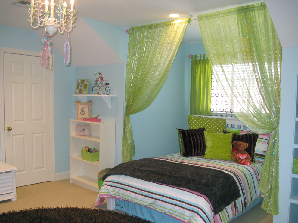 Inspiration for a contemporary girl kids' room remodel in Houston with blue walls