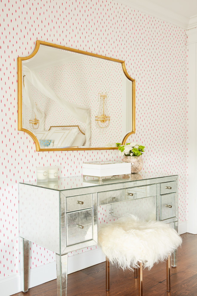 Example of a transitional girl kids' room design in Los Angeles with pink walls