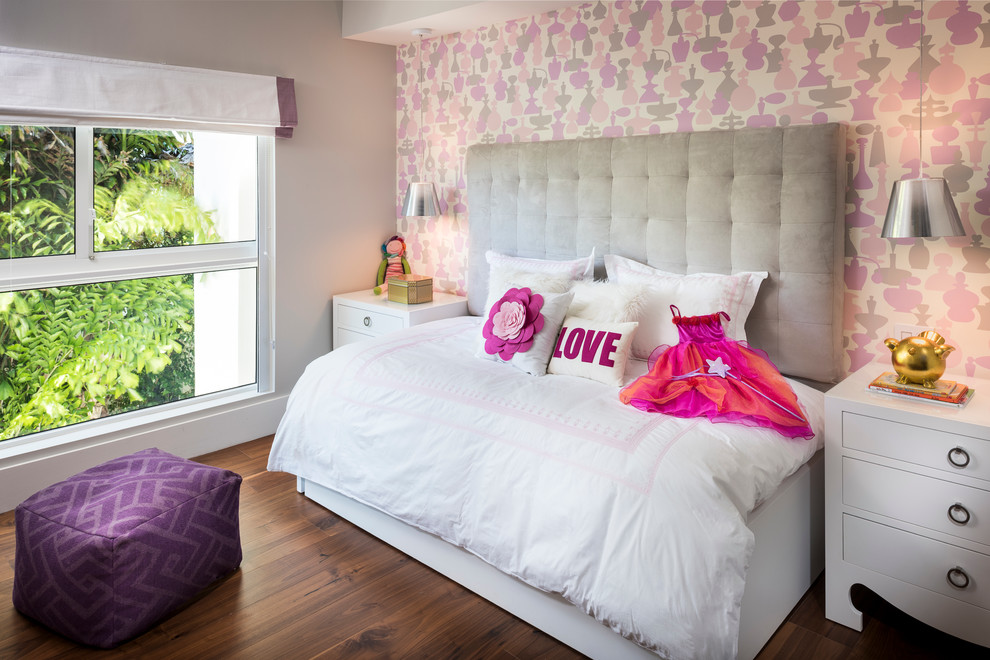 Example of a mid-sized trendy girl dark wood floor kids' bedroom design in Miami with multicolored walls