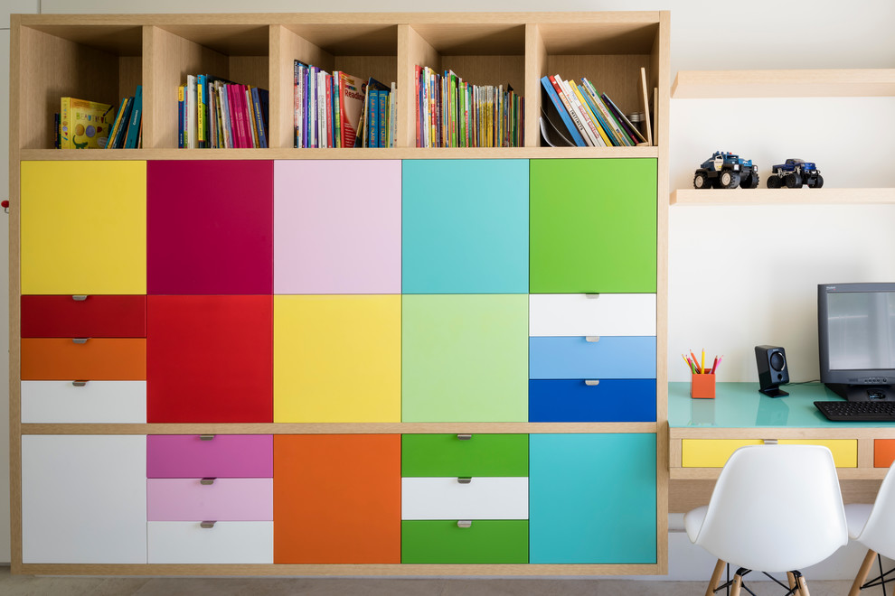 Example of a large trendy gender-neutral playroom design in Miami with white walls
