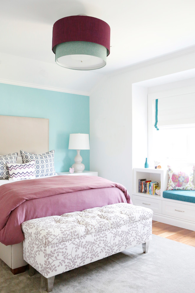 Inspiration for a medium sized classic children’s room for girls in Los Angeles with blue walls, carpet and grey floors.