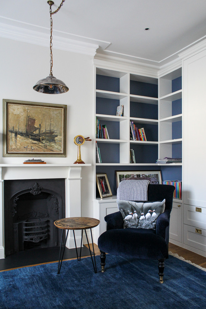 Design ideas for a large victorian kids' bedroom for boys in London with white walls.