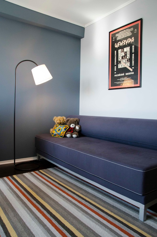 This is an example of an eclectic kids' bedroom in Chicago with grey walls.